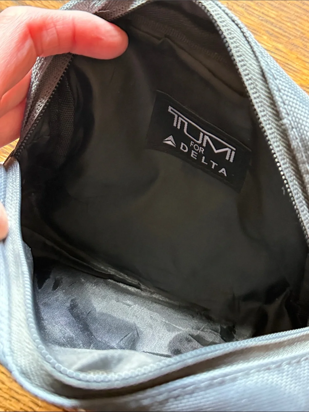 Small Tumi Gray Men's Toiletry Pouch with Silver Accent